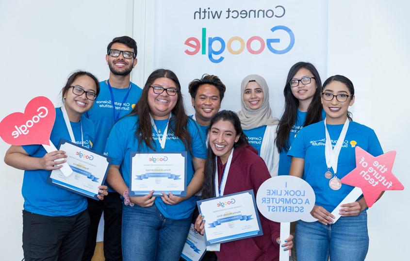 A group of students celebrating their Connect with Google certificates.