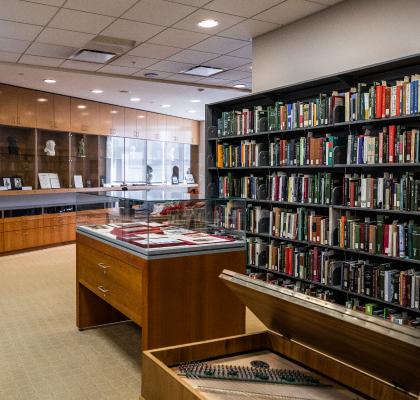 Inside of the Beethoven Center, with bookshelves and display cases